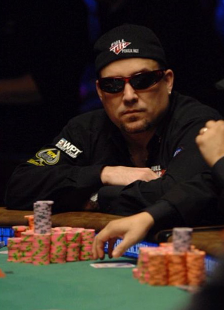 Lee Childs seated behind his chips at the World Series of Poker